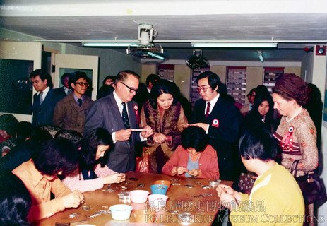 In 1976, Po Leung Kuk opened its first external sheltered workshop and residential unit outside the Headquarters, in Kowloon Ko Chiu Road. Mr D.C. Bray (first from left), Secretary for Home Affairs and Mrs Bray (first from right) visited as officiating guests in March 1976.