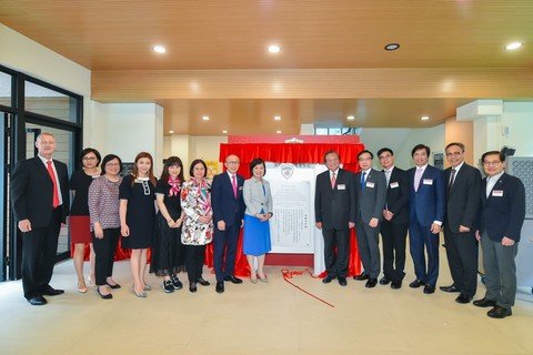 Plaque unveiling ceremony by the officiating guests. 