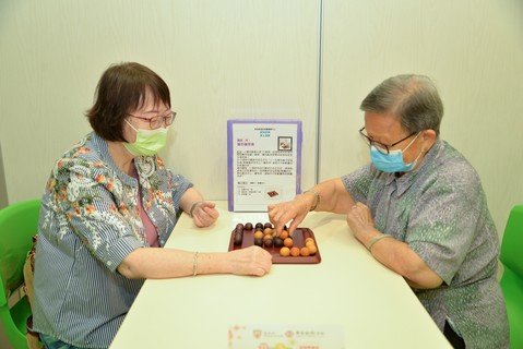 The Joyous Resource Corner is equipped with various types of board games for the elderly, caregivers and people in need to borrow. 